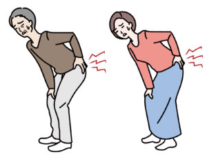 腰痛に苦しんでいる男性と女性
